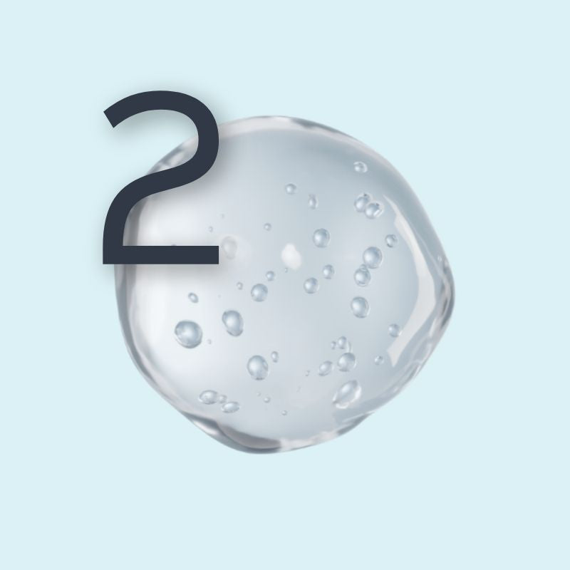 Number 2 overlayed on AlumierMD skincare product swatch