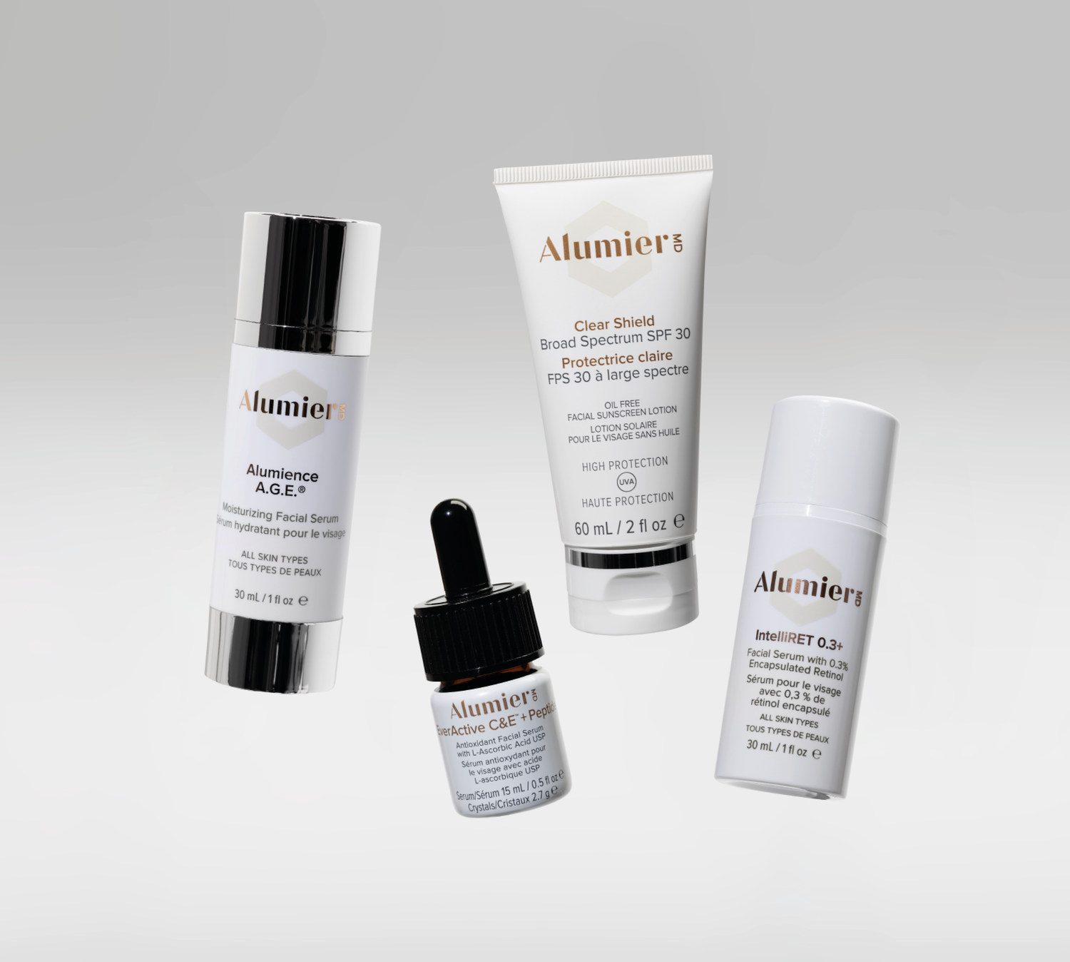 AlumierMD skincare routine with vitamin C serum, retinol treatment, moisturizer, and mineral SPF for daily skin health and oxidative aging defense